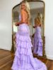 Back view of the lavender mermaid dress, with lace details continuing to a low back or train.
