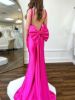Back view of the hot pink mermaid dress, with a low back or simple seam for a clean look.