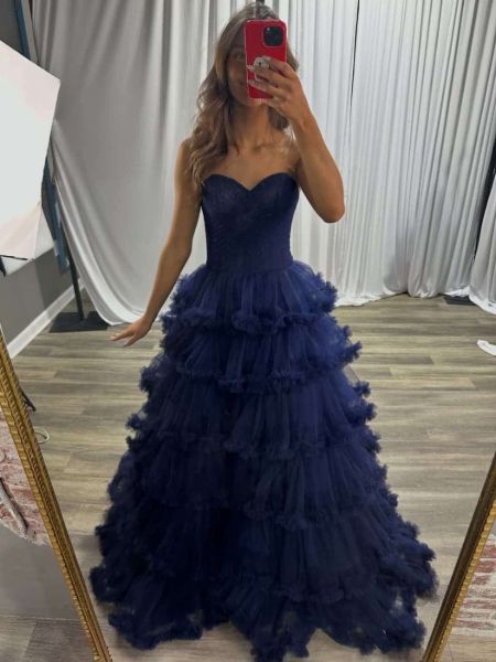 Detailed shot of the layered tulle and lace skirt, showing its depth and texture.