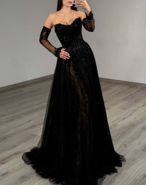 Front view of a black prom dress combining sequins and lace, featuring elegant detachable sleeves.