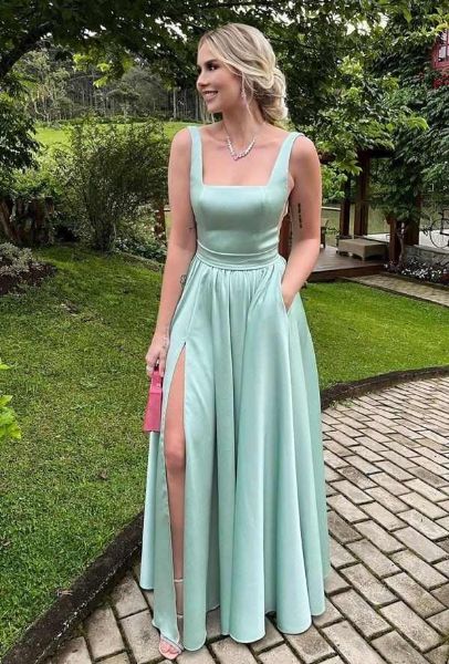 Mint green satin bridesmaid dress featuring a classic square neckline and sleek silhouette.