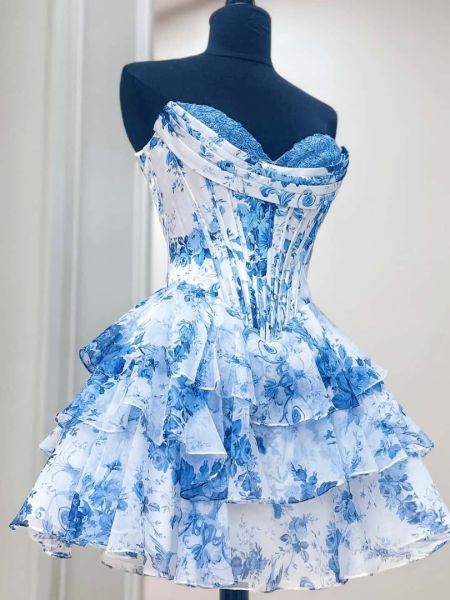 Blue floral print homecoming dress with a sweetheart neckline and cascading ruffles.