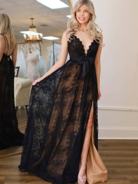 Black lace sheer prom dress with a deep plunging V-neckline and long sleeves.