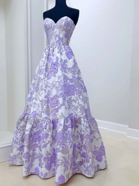 Lavender floral jacquard prom dress with a strapless sweetheart neckline and full skirt.