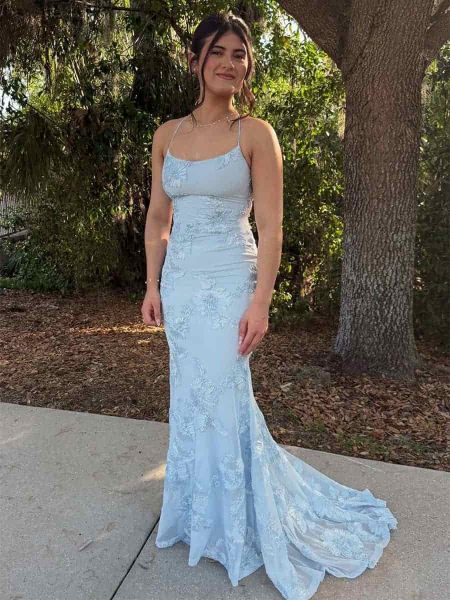 Light blue prom dress with a fitted bodice, mermaid skirt, and a flowing train.