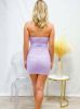 Back view of the lavender ruched dress, showing the strapless back and contoured fit.