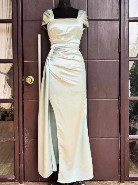 Sage green square neck prom dress with fitted silhouette and dramatic thigh-high slit.
