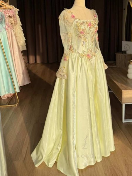 Long sleeve square prom dress with intricate floral embroidery on sheer sleeves and bodice.