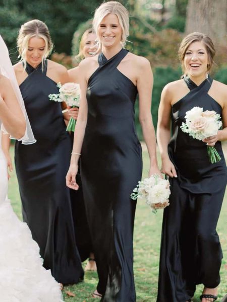 Black halter sheath bridesmaid dress with convertible straps, sleek fitted silhouette, and elegant halter neckline.