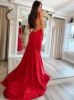 Back view of red matte mermaid dress showing elegant back, fitted silhouette, and flowing train.