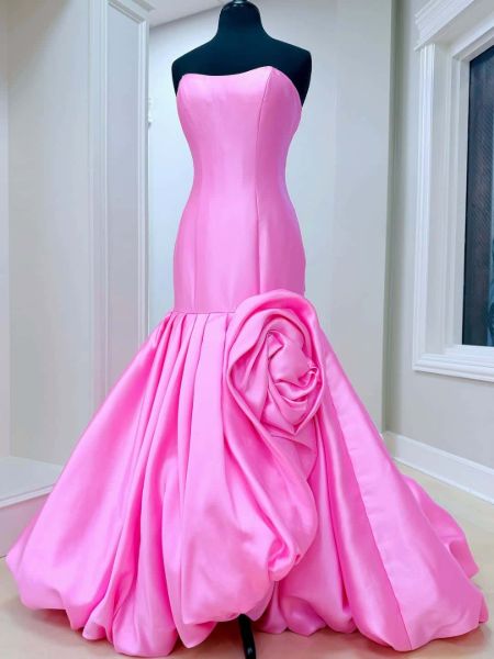 Hot pink satin strapless mermaid prom dress with cascading 3D roses, sweetheart neckline.